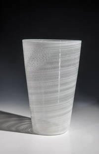 Vase ''a mezza filigrana'': Vase ''a mezza filigrana'' Carlo Scarpa (design), Venini, Murano, 1932 - 36 Colorless glass with fused threads in opaque white ('lattimo'). Marked: venini murano (two-line etched stamp). H. 25 cm