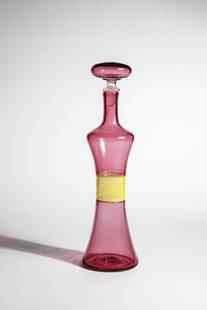 Bottle with stopper ''Incalmo: Paolo Venini (design), Venini, Murano, 1959 Colorless glass, ruby pink underlay, with yellow 'mezza filigrana' band, fused in 'incalmo' technique. Marked by venini murano ITALIA (etched stamp). H.