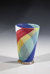 Cup vase ''mezzafiligrana'': Cup vase ''mezzafiligrana'' Aureliano Toso (attributed), Murano, 50s Colorless glass, with multicolored glass threads fused diagonally. Attached foot in colorless with gold foil fusion. H. 13 cm