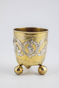 Ball foot cup: Spherical footed cup Breslau, 2nd half 18th century Silver, partly gilded. On the wall in three rocailles various portraits in high relief. Between them palm branches and other rocailles. On the lip