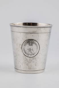 Mug: Cup Horses (Jutland, Denmark), 1765 silver. The wall with three Danish coins embedded, one coin also in the bottom. Bottom stamped with city and unknown master's mark with date. H. 10,9 cm. 258 g.