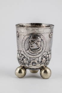 Ball foot cup: Ball-foot cup Stockholm, around 1700 Silver, partly gilded. On the wall three round medallions with profile portraits in high relief. Between them fruit bushes. Bottom side stamped with city and