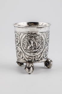 Ball foot cup: Ball foot cup Probably Austria, 17th century silver. On the wall in two round medallions antique scenes in relief between acanthus decor. Bottom side stamped with unknown city and master's mark and