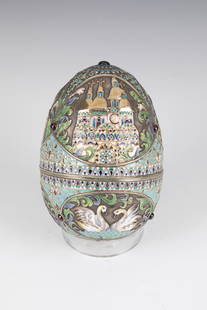 CloisonnÃ© enamel egg tin with church architecture and swans: CloisonnÃ© enamel egg box with church architecture and swans Russia, stamped Ovchinnikov, probably 1892 silver, partly gilded. The lower part of the ovoid wall with three pairs of swans, on the