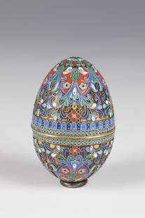 CloisonnÃ© enamel egg: CloisonnÃ© enamel egg 2nd half of the 20th century, silver, gilded. Ovoid wall polychrome decorated with floral motifs on a hallmarked background. The egg body to open. Pseudo-Russian brands. H.