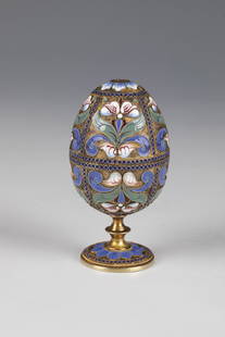 CloisonnÃ© enamel egg double cup: CloisonnÃ© enamel egg double cup Russia, Moscow, probably Maria Semenova, 1908-1917 silver, gilded. On a round hollow base, shaft with pressed nodus. Ovoid body divided into two halves. The wall is