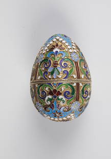 CoisonnÃ© Enamel Easter Egg: CoisonnÃ© enamel Easter egg St. Petersburg, Grigory Pankratev, 1908-1917 silver, gilded. Horizontal division into two halves. The ovoid wall is decorated in blue, red, white and green cloisonnÃ©