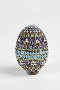 CloisonnÃ© enamel egg: CloisonnÃ© enamel egg Russia, stamped Ovchinnikov silver. Ovoider body with stylized floral and geometric ornaments as well as pearl borders. Stamped with master mark ''PO'' and fineness ''84''.