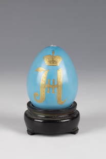 Porcelain Easter egg with monogram Nicholas II.: Porcelain Easter egg with monogram Nicholas II. Good Russia, St. Petersburg, 1894-1917 Crowned monogram of Emperor Nicholas II of Russia executed in two types of gold. H. 9 cm