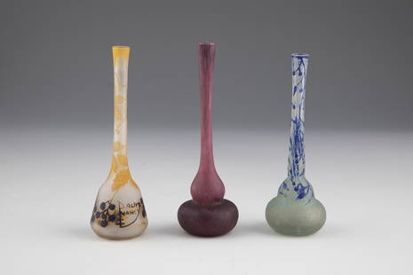 Three small vases: Three small vases Daum FrÃ¨res, Nancy, c. 1910 flashed and flashed glass as well as with multicolored powder melting. Two vases with etching decoration in relief all around: flowers and buds with