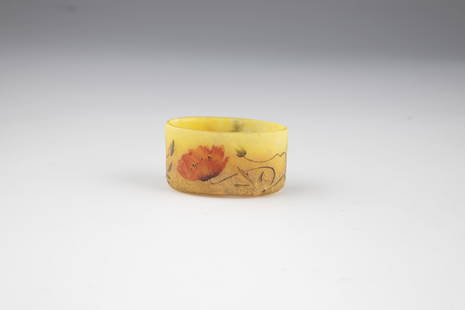 Miniature bowl with poppy seeds: Miniature bowl with poppy seeds Daum FrÃ¨res, Nancy, c. 1914 Colorless glass, with enclosed powder in yellow and orange. Decorated with etching etched in basal relief, painted in colorful enamel: