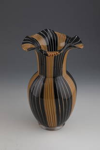 Vase ''A Canne'': Vase ''A Canne'' Dino Martens (design), Aureliano Toso, Murano, c. 1954 Colorless glass, with ribbon melting in black-violet and honey-yellow. Applied, colorless stand ring. H. 31 cm.