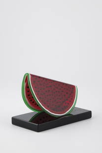 Slice of a watermelon: Disc of a watermelon Luciano Vistosi, Murano, 1993 Centrally bent disc, designed in the naturalistic colours of red, green and some white, on a black glass base. At the edge sign. and dat. ''L. Vistos