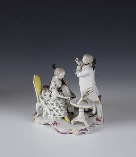 Musical couple as ''The Ear'' from a series of allegories of the five senses: Musical couple as ''The Ear'' from a series of allegories of the five senses Nymphenburg, early 20th century, based on a Frankenthal model by Joh. F. Lueck On an irregular, purple-coated rocaille