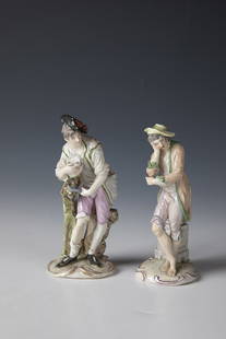 Two gardeners: Two gardeners Ludwigsburg, 18th century Two young gardeners standing on a rocaille pedestal, one pruning a tree. Polychrome painted and partly with gold decoration. Bottom with underglaze blue