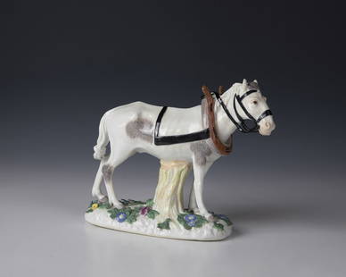 Horse with pulling harness: Horse with harness Meissen, ca. 1750, after a design by Johann Joachim Kaendler On an oval base with naturalistic flowers. The white horse with plough harness in overglaze painting. On the underside