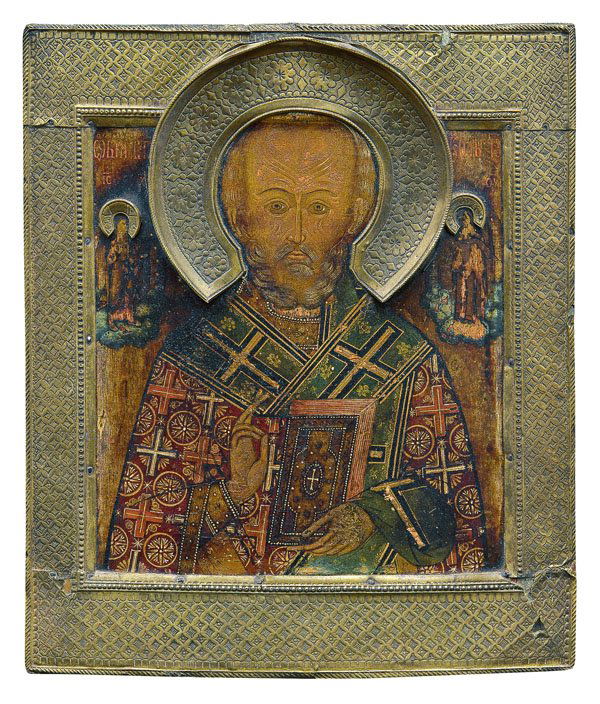 Große Ikone mit dem heiligen Nikolaus von Myra: Große Ikone mit dem heiligen Nikolaus von Myra Russland, 1. Hälfte 19. Jh. Tempera auf Kreidegrund auf Holz. Traditionelle Wiedergabe des Heiligen in frontaler Halbfigur flankiert von Christus und d
