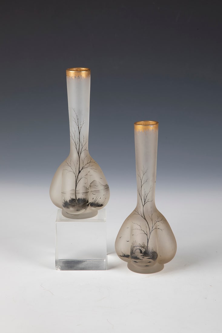 Pair of vases: Pair of vases France, 20th century Colourless glass with black plumb decoration painted on the front: tree-lined river landscape with a small bridge and mountain ranges in the background. Acid matted.