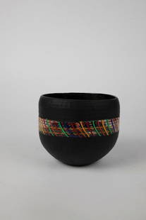 VASE ''FUNTIME'S CUP'': VASE ''FUNTIME'S CUP'' Tsuchida Yasuhiko, 2000 Colourless and opaque black glass, reworked with matt carving structures ('battuto'), melted multi-coloured glass rods. Inscribed in vibro-engraving: Tsu