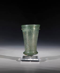 Rare Bell Beaker: Rare bell beaker Franconian Empire, Merovingian period, 6th century. Compressed, oblique optically blown wall slightly iridescent. Two intersecting cracks in the wall. h. 11.4 cm Cf. Lit.: Verre