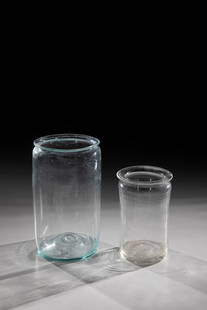 Two binding jars: Two binding glasses Southern Germany, 18th/19th century Colourless or light green glass with slightly raised bottom and tear-off, constricted below the mouth. H. 12.2-16.3 cm