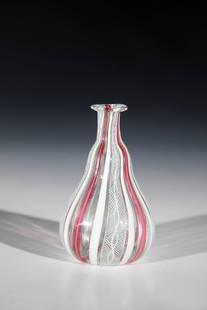 Small Double Pumpkin Bottle: Small double pumpkin bottle Venice, M. 18th century. Slightly greyish glass with tear-off. Alternating latticino threads, partly ruby-red overlay, and spiral threads in quadruple repeat. h. 9.5 cm