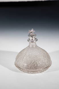 Ice glass bottle with silver mount: Bottle made of ice glass with silver mount Saxony, 17th century Pressed, spherical body with tear and circumferential thread support. Mount on the spout and silver stopper with engraved floral