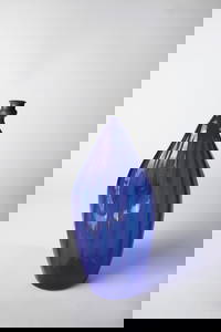 Navel bottle made of cobalt blue glass