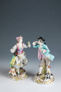 Cavalier and gardener: Cavalier and Gardener Meissen, late 20th century Cavalier and Standing Gardener standing on a rocaille base with tree support, both striding forward. The gardener with a lamb on her right and the