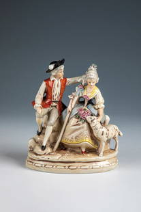 Gallant scene with sheep: Gallant scene with sheep Around 1900 Shepherd couple sitting on an oval rock support base with a sheep on their right. polychrome staffed. Underside with crowned S with addition ''Germany''