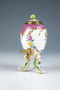 Perfume fountain: Meissen Perfume Fountain, c. 1800 Ovoider body on three relief-plated, high rocaille feet. Richly decorated with violet scale mosaic and flower garlands in polychrome on-glaze painting. Gold