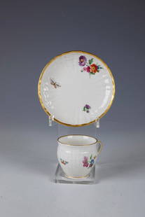 Two cups with saucers: Two cups with saucers KPM Berlin, 1830-50 Cup shape on a standing ring with gold-heightened ear handle on the side. The cups and the flag of the saucers are painted polychrome with flowers and