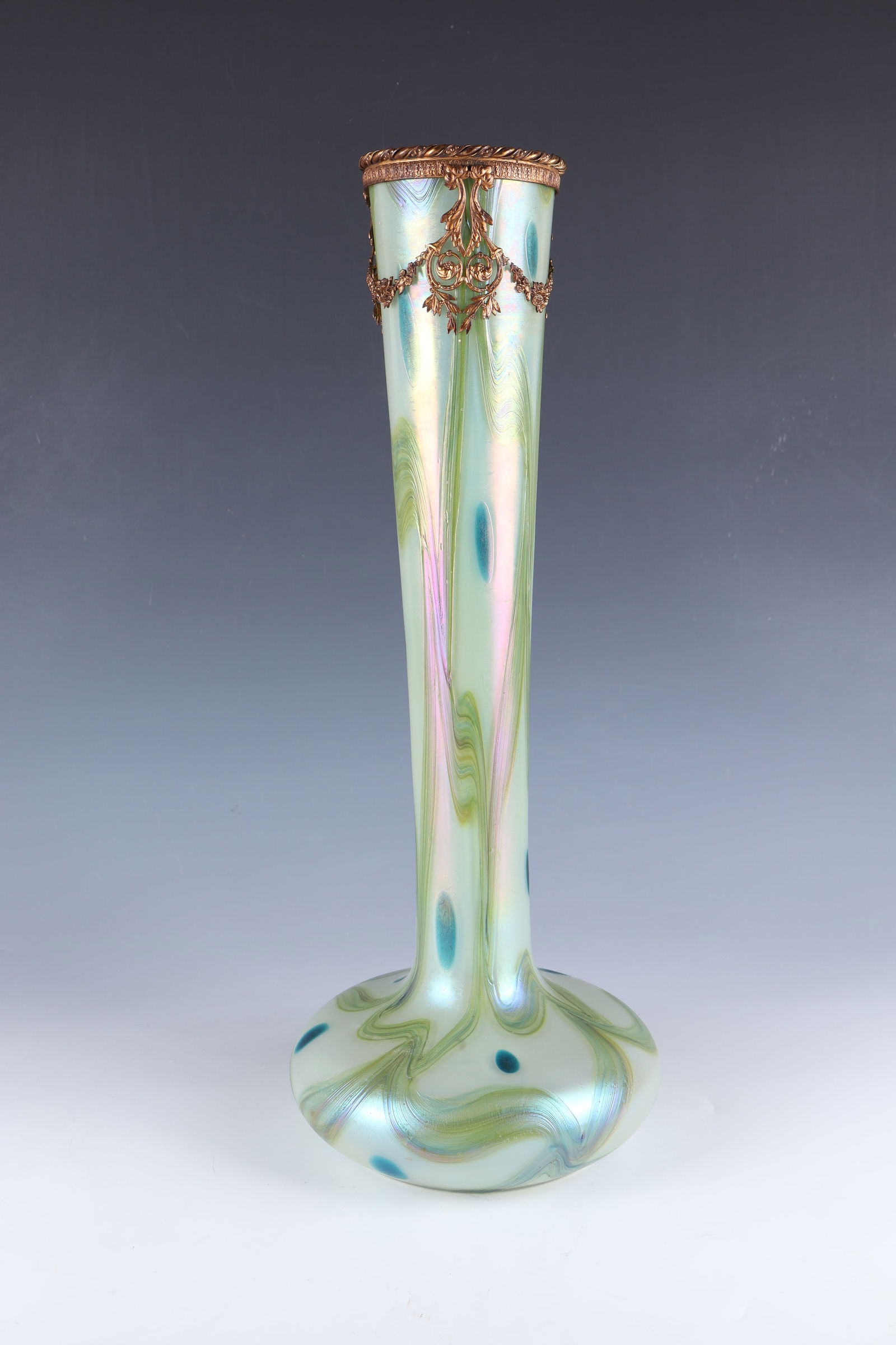 Seltene Long Neck Vase: Rare long-necked vase Loetz Wwe., Klostermühle, c. 1900 On light blue opal colourless top layer with broadly wound, colourless veined threads in silver yellow. In between, melted turquoise blue dots