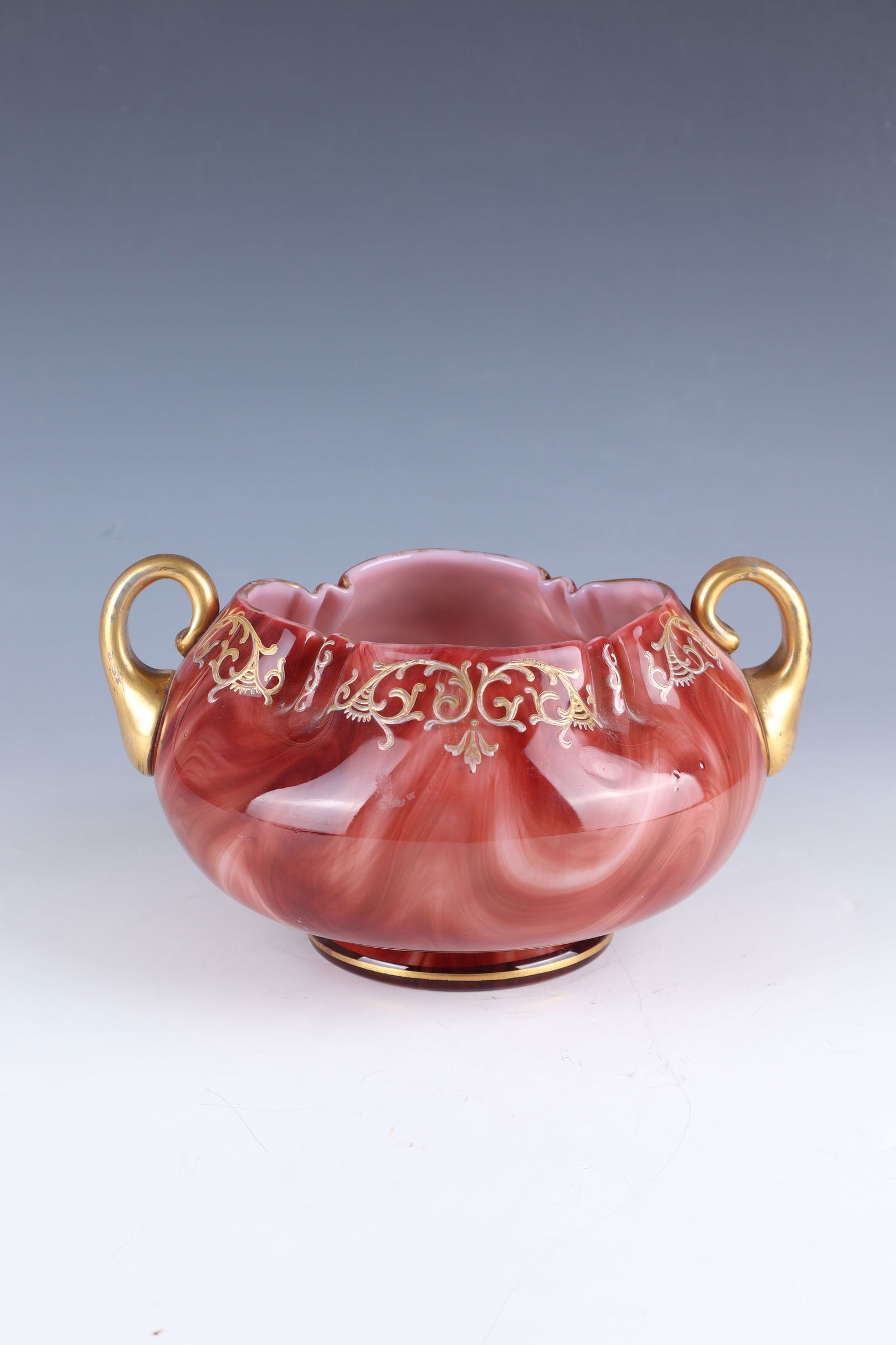 Double-handled bowl ''Carnelian'': Double-handled bowl ''Carnelian'' Loetz Wwe., Klostermühle, 1888/89 White opal glass, overlaid with carmine red veined clear glass. Repeating ornamental decoration all around in polished gold and whi