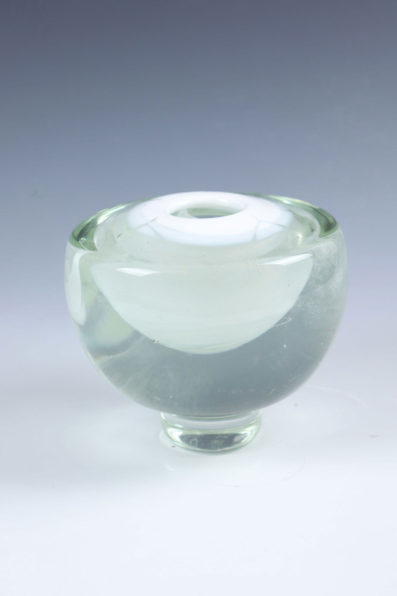 Heavy Small Vase: Heavy Small Vase Andries Dirk Copier, 1950-1980 Light chartreuse green, thick-walled glass on a small base with white oxide fusion in the intermediate layer. Small opening. Inscribed under the stand: