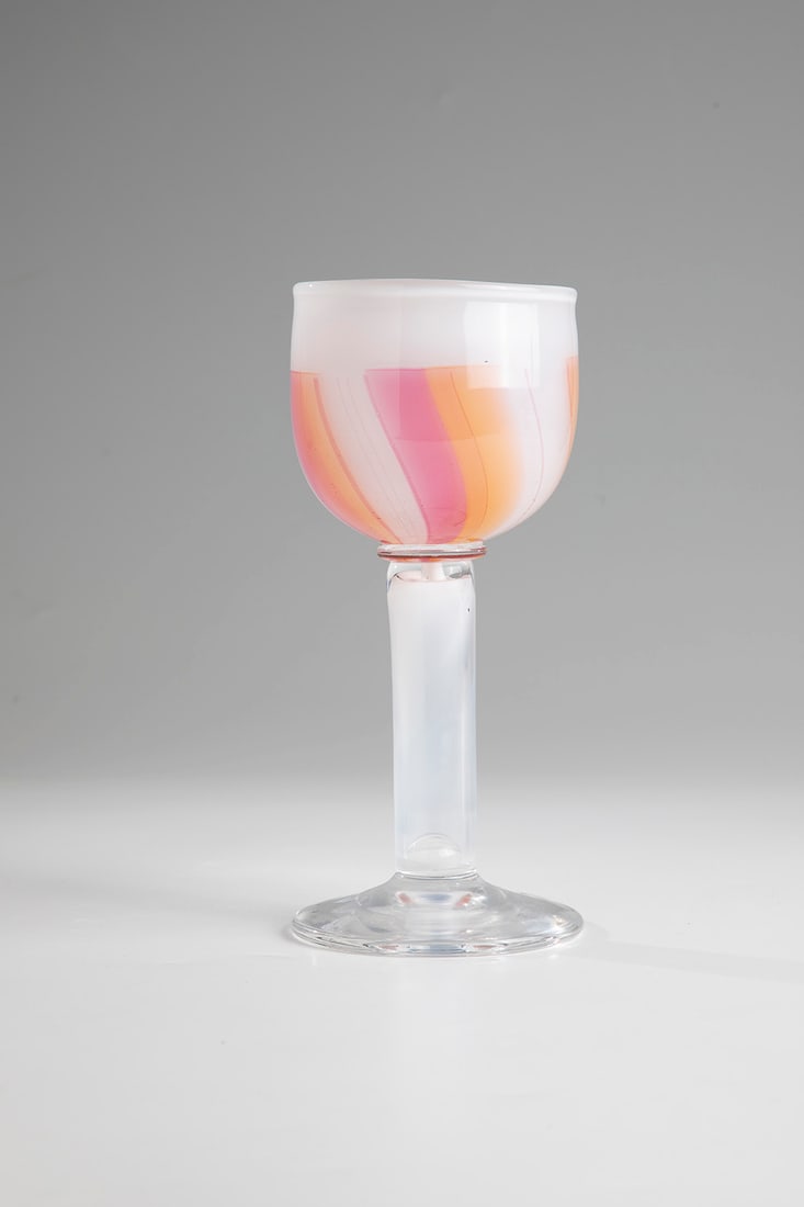 Cup glass: Goblet Bengt Edenfalk (design), Kosta Boda, Sweden, 2nd half of the 20th century. Kuppa with opaque white underlay, interlayer decoration of gradient pink and orange fusions in alternating order. Insc