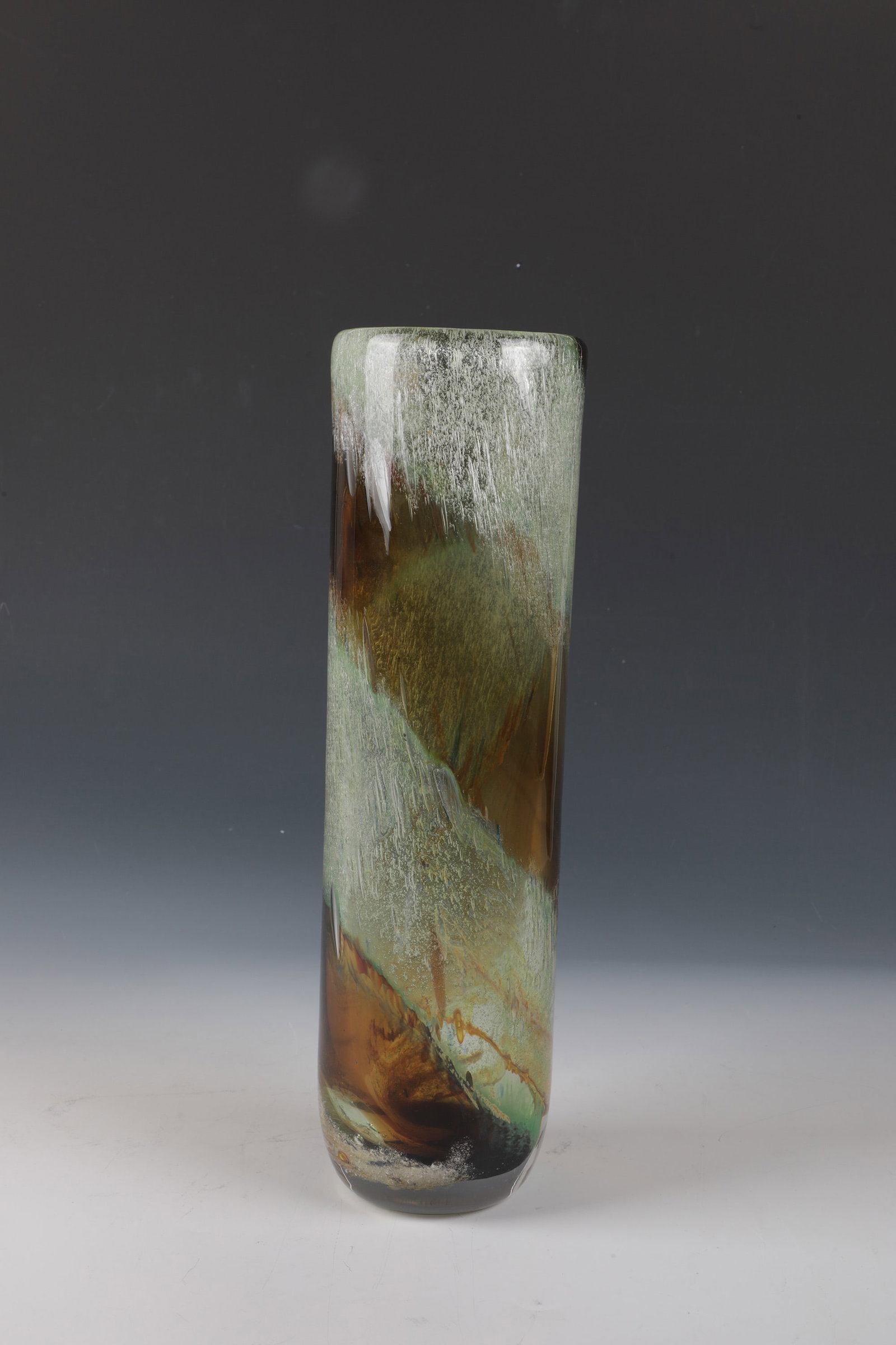 Tall Vase: Tall vase 20th century Thick-walled, colorless glass with amber underlay. Interlayer décor of coloured oxide meltings and incorporated air bubbles. H. 36 cm. Hohe Vase 20. Jahrhundert Dickwandige