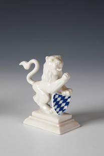 Bavarian Lion: Bavarian lion Nymphenburg, first half of the 20th century, after a design by Ernst Andreas Rauch Standing on a stepped pedestal and on hind legs. The coat of arms painted blue. Underside with