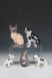 Five animal depictions: Five animal depictions Bing & Gröndahl and Royal Copenhagen, Copenhagen, 1920s Three dogs, a cat and a baboon. Polychrome decorated in underglaze painting. On the underside, all parts with