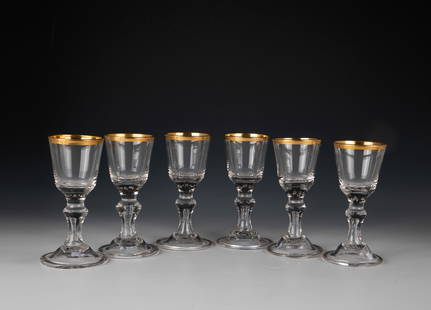 Set of six trophies: Set of six goblets Lauenstein, c. 1770 Colourless glass with tear-off. Slightly curved disc base with folded edge downwards. Hollow baluster shaft. In the base of the cuppa, seven pierced air beads.