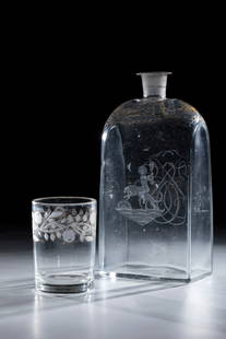 Square bottle with putto on panther and mug: Square bottle with putto on panther and cup Sweden, Orrefors, after 1900 Rectangular body in cross-section. Frontally cut putto with chalice riding a panther. Ligature monogram on the back. On the sho