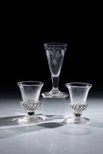 Pair of foot cups and small goblet: Pair of foot cups and small goblet, France or England, 19th century, colourless glass with tear-off. Attachment of the bell-shaped cuppa ribbed obliquely optically. H. 8.5 cm disc base with tear-off,