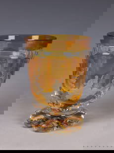 Foot cup with the three Parcae: Foot cup with the three Parcas of North Bohemia, c. 1845 Colourless, partially amber-stained glass decorated with notch, ray, roller and peel cuts. On the bell-shaped cuppa high-cut medallion with fin
