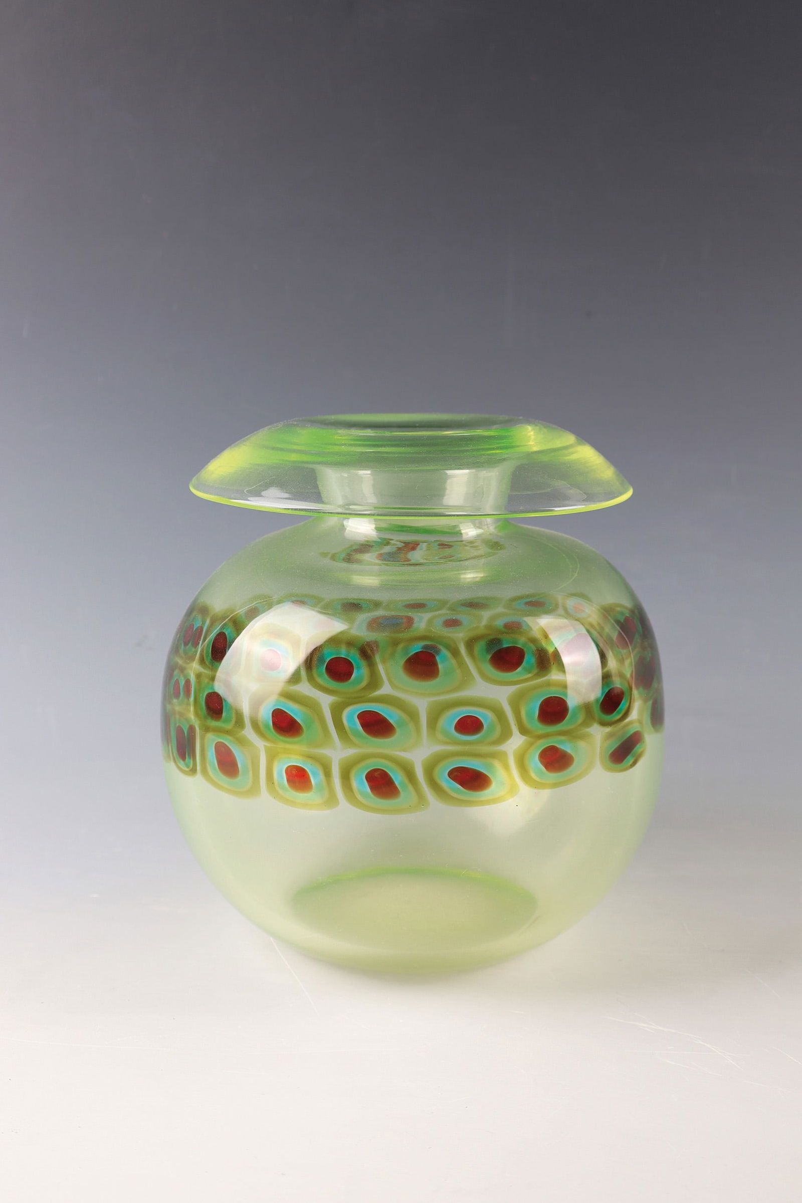 Vase ''Murrine'': Vase ''Murrine'' Antonio Da Ros (design), Vetreria Gino Cenedese, Murano, c. 1969 Light yellow-green uranium glass with melted, three-row band of coloured murrine. h. 18.5 cm. Lit.: M. Heiremans, Mura
