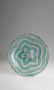 Plate ''A spina'': Plate ''A spina'' Ercole Barovier (draft), Barovier & Toso, Murano, 1957 Colourless glass with dense melting of bevelled, herringbone line and ribbon glass rods in green and white opal. Inscribed in v