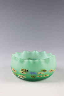 Decorative handle bowl ''a murrine floreali'': Decorative Handle Bowl ''a murrine floreali'' Fratelli Toso, Murano, c. 1910-15 Green glass, opal white underlaid with multi-coloured flower-shaped inclusions. Wavy lip rim. Surface acid-matted. H. 5