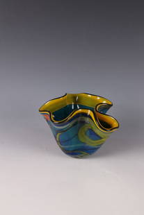 Small vase: Small vase Ioan Nemtoi, Romania Colorless glass. Polychrome décor of melted paint streaks and orange-red crumble melting. H. 12.5 cm.