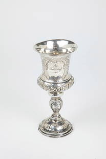Goblet Cup: Goblet, dated 1858, silver. Small, round hollow base above it shaft with disc nodi and the goblet-shaped cuppa with flared edge. Extensively decorated with engraved and embossed flower and seed decora