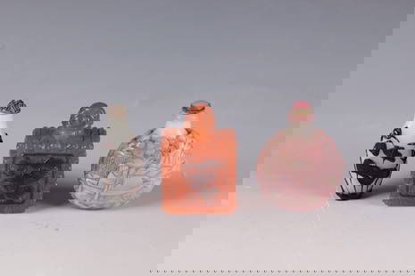 Three Snuff Bottles: Three Snuff Bottles China, Qing Dynasty, 19th Century Three snuff bottles, including one made of frosted glass with a dark purple glass overlay. Relief decoration with motifs such as dragons and a pal