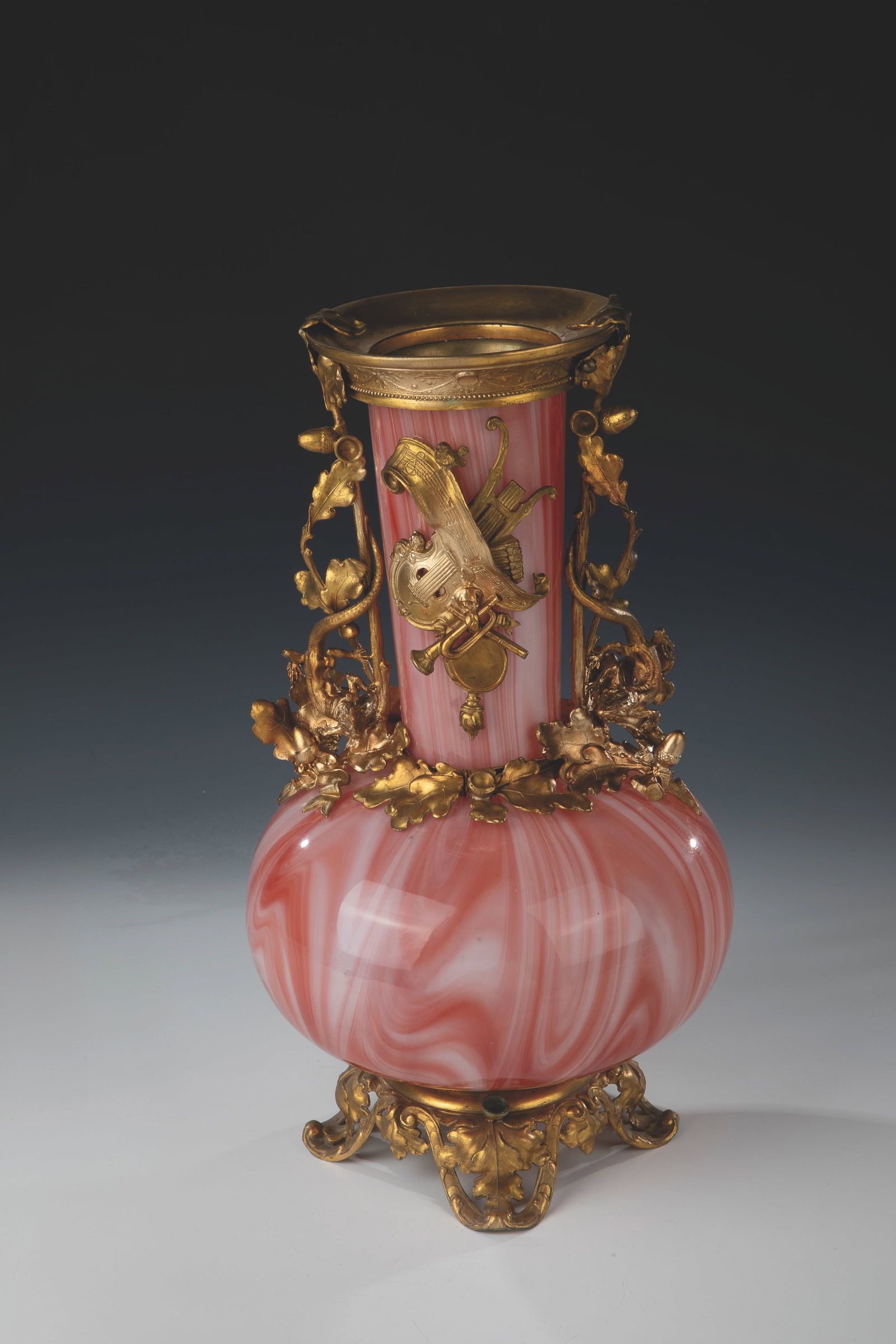 Magnificent vase ''Carnelian'': Magnificent vase ''Carnelian'' Loetz Wwe., Klostermühle, c. 1889 Carmine red veined opaque glass with colourless overlay. Base and mount on the neck and muzzle in gold-coloured metal with oak leaves